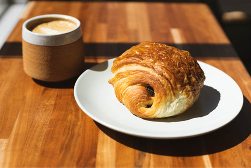 Hearth Bakery Chocolate Croissant and Latte